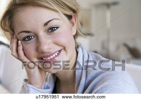 Stock Image - Close up of smiling woman. Fotosearch