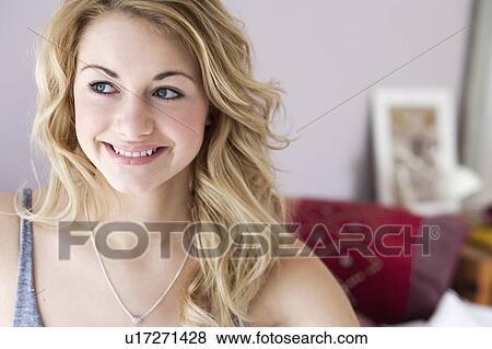 Close up of smiling woman View Large Photo Image Stock Photo - Close up of smiling woman. Fotosearch