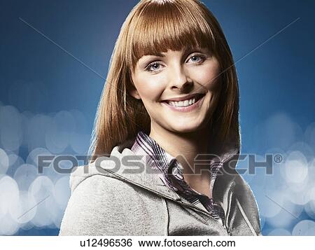 Stock Photograph - Close up of smiling woman's face. Fotosearch