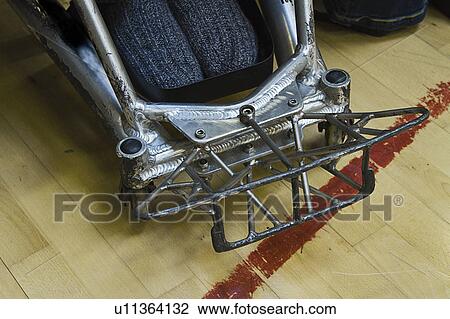 Stock Image - Close up of wheelchair sports bumper. Fotosearch