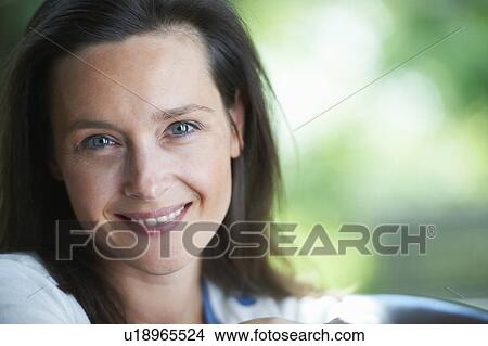 Picture - Close up of woman smiling. Fotosearch
