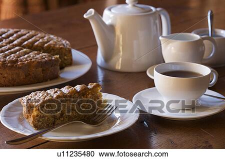 Coffee and cake on table View Large Photo Image Stock Image - Coffee and cake on table. Fotosearch