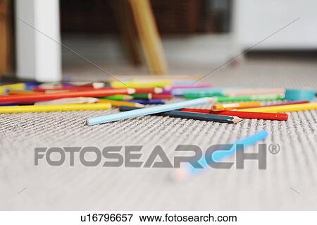 Colored pencils in pile on floor View Large Photo Image Stock Photo - Colored pencils in pile on floor. Fotosearch