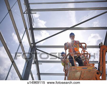 Construction workers in cherry picker View Large Photo Image Stock Photography - Construction workers in cherry picker. Fotosearch