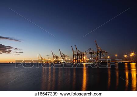 Container crane machinery in shipyard View Large Photo Image Stock Photo - Container crane machinery in shipyard. Fotosearch