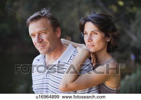 Couple admiring view View Large Photo Image Stock Photo - Couple admiring view. Fotosearch