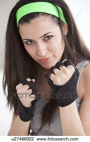 Defensive woman in boxing gloves View Large Photo Image Stock Image - Defensive woman in boxing gloves. Fotosearch