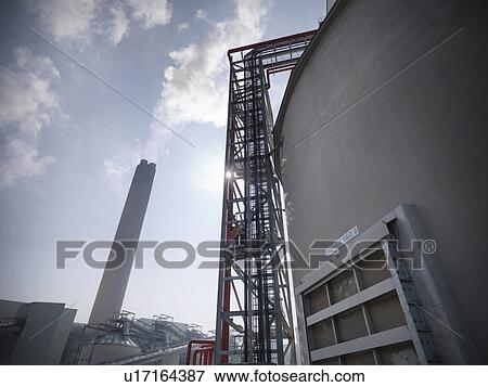 Elevator at biomass storage facility View Large Photo Image Stock Photo - Elevator at biomass storage facility. Fotosearch