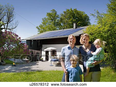 Family at home with solar panel View Large Photo Image Stock Image - Family at home with solar panel. Fotosearch