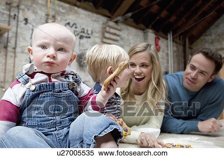Family making cookies in kitchen View Large Photo Image Stock Photography - Family making cookies in kitchen. Fotosearch