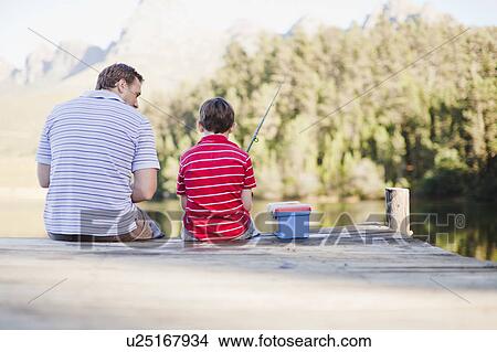Father fishing with son in lake View Large Photo Image Picture - Father fishing with son in lake. Fotosearch