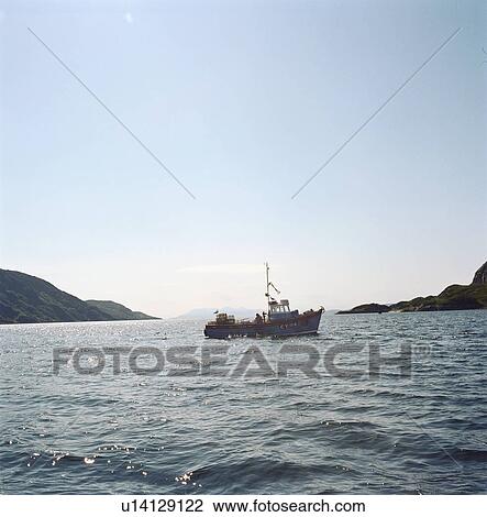 Fishing boat on lake View Large Photo Image Stock Image - Fishing boat on lake. Fotosearch