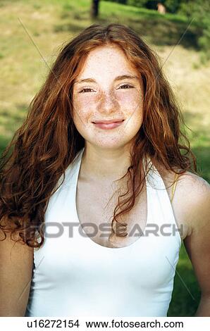 Girl smiling outdoors View Large Photo Image Picture - Girl smiling outdoors. Fotosearch