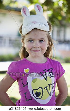 Girl wearing rabbit mask outdoors View Large Photo Image Stock Photography - Girl wearing rabbit mask outdoors. Fotosearch