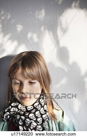 Girl wearing skull-pattern scarf View Large Photo Image Stock Image - Girl wearing skull-pattern scarf. Fotosearch