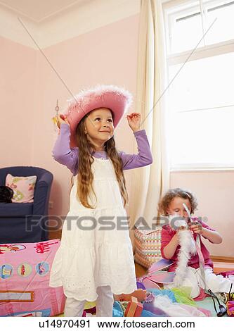 Girls playing dress up together View Large Photo Image Stock Image - Girls playing dress up together. Fotosearch