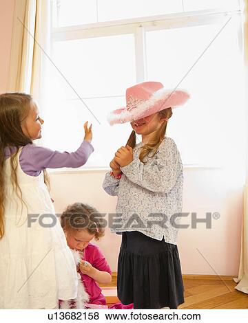 Girls playing dress up together View Large Photo Image Stock Photo - Girls playing dress up together. Fotosearch