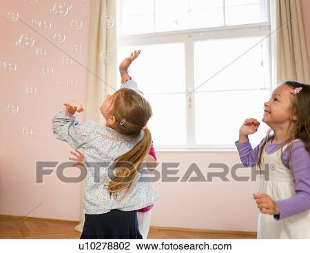 Girls playing with bubbles together View Large Photo Image Stock Image - Girls playing with bubbles together. Fotosearch