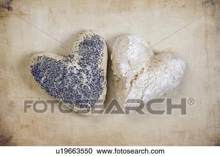 Stock Image - Heart shaped bread rolls. Fotosearch