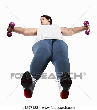 Large woman lifting weights View Large Photo Image Stock Image - Large woman lifting weights. Fotosearch