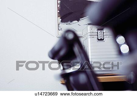 Locked aluminum case in office View Large Photo Image Stock Photo - Locked aluminum case in office. Fotosearch