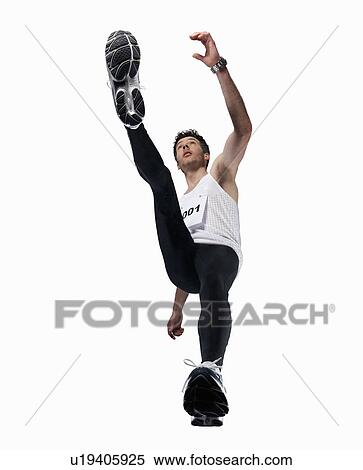 Low angle view of man jogging View Large Photo Image Stock Photography - Low angle view of man jogging. Fotosearch