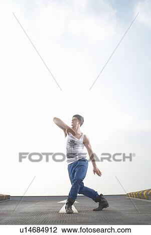 Man dancing in road View Large Photo Image Stock Image - Man dancing in road. Fotosearch