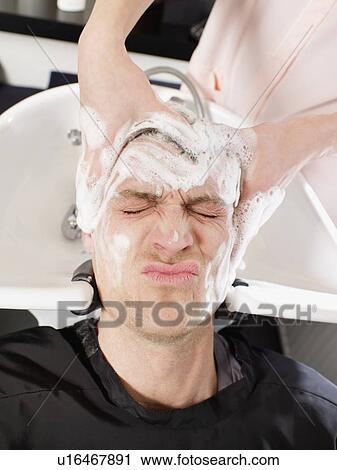 Man having hair washed in salon View Large Photo Image Stock Image - Man having hair washed in salon. Fotosearch