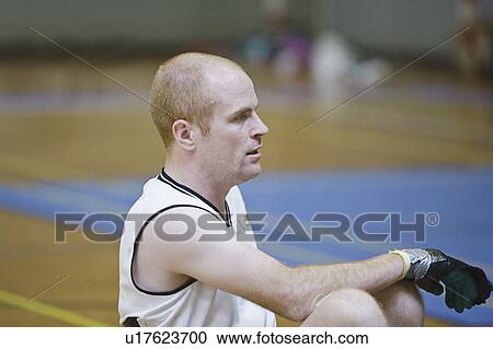 Man in wheelchair playing indoor sports View Large Photo Image Stock Image - Man in wheelchair playing indoor sports. Fotosearch