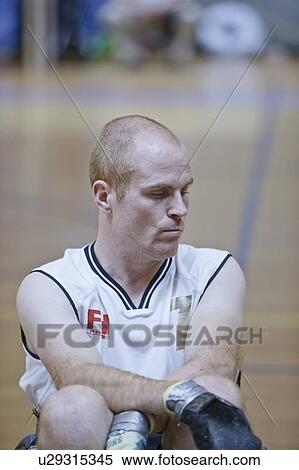 Man in wheelchair playing indoor sports View Large Photo Image Stock Photography - Man in wheelchair playing indoor sports. Fotosearch