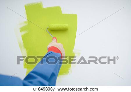 Man painting wall View Large Photo Image Stock Photo - Man painting wall. Fotosearch