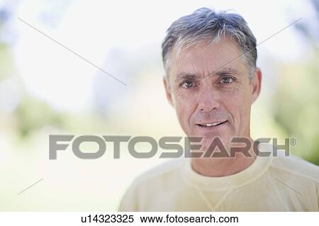 Man smiling outdoors View Large Photo Image Stock Photography - Man smiling outdoors. Fotosearch