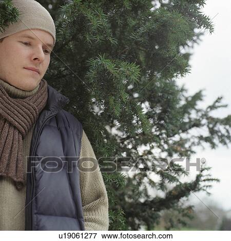 Man standing in bush outdoors View Large Photo Image Stock Photo - Man standing in bush outdoors. Fotosearch