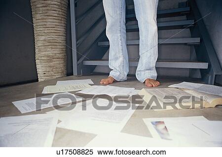 Man surrounded by papers on floor View Large Photo Image Stock Photography - Man surrounded by papers on floor. Fotosearch