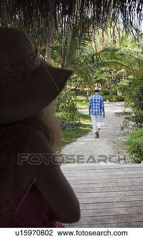 Man walking away from girlfriend View Large Photo Image Stock Image - Man walking away from girlfriend. Fotosearch