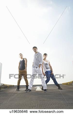 Men dancing in road View Large Photo Image Stock Photograph - Men dancing in road. Fotosearch
