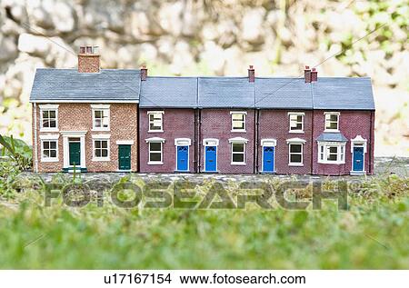 Picture - Model houses on stone outdoors. Fotosearch