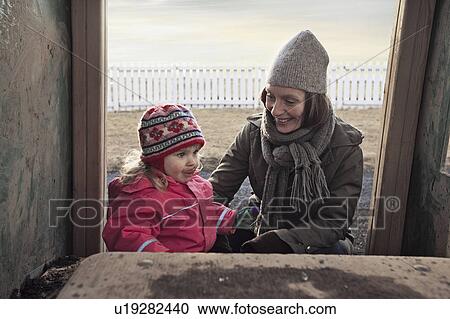 Mother and daughter playing outdoors View Large Photo Image Stock Image - Mother and daughter playing outdoors. Fotosearch