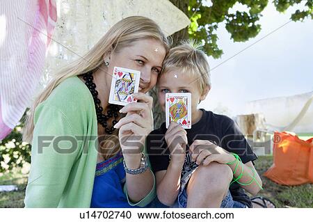 Mother and son playing with cards View Large Photo Image Stock Image - Mother and son playing with cards. Fotosearch