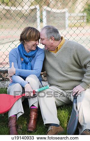 Older couple touching foreheads View Large Photo Image Stock Image - Older couple touching foreheads. Fotosearch