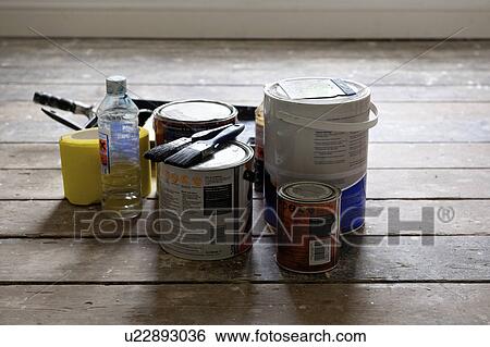 Paint cans and brushes in empty house View Large Photo Image Stock Photograph - Paint cans and brushes in empty house. Fotosearch