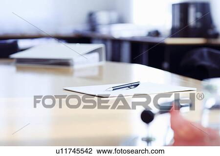 Papers and pen on office desk View Large Photo Image Stock Image - Papers and pen on office desk. Fotosearch