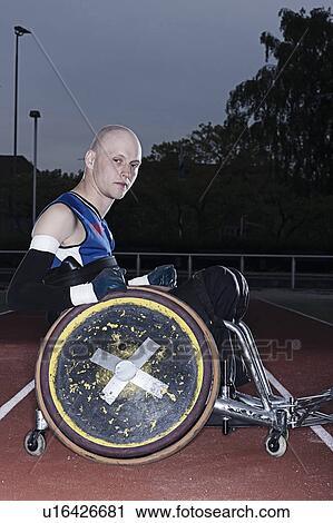Para rugby player in wheelchair on track View Large Photo Image Stock Image - Para rugby player in wheelchair on track. Fotosearch