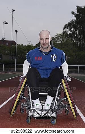 Para rugby player in wheelchair on track View Large Photo Image Stock Image - Para rugby player in wheelchair on track. Fotosearch
