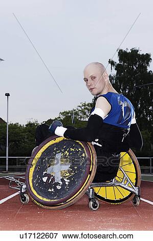 Para rugby player in wheelchair on track View Large Photo Image Stock Photo - Para rugby player in wheelchair on track. Fotosearch