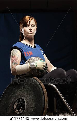 Stock Image - Para rugby player in wheelchair. Fotosearch