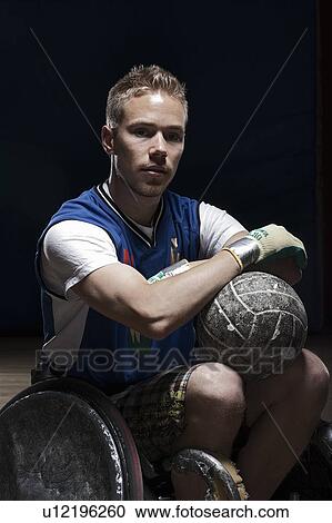 Stock Image - Para rugby player in wheelchair. Fotosearch