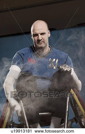 Stock Image - Para rugby player in wheelchair. Fotosearch