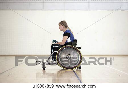 Stock Photo - Para rugby player in wheelchair. Fotosearch