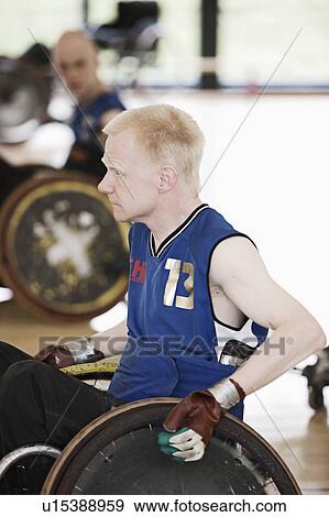 Para rugby player in wheelchair View Large Photo Image Stock Photo - Para rugby player in wheelchair. Fotosearch